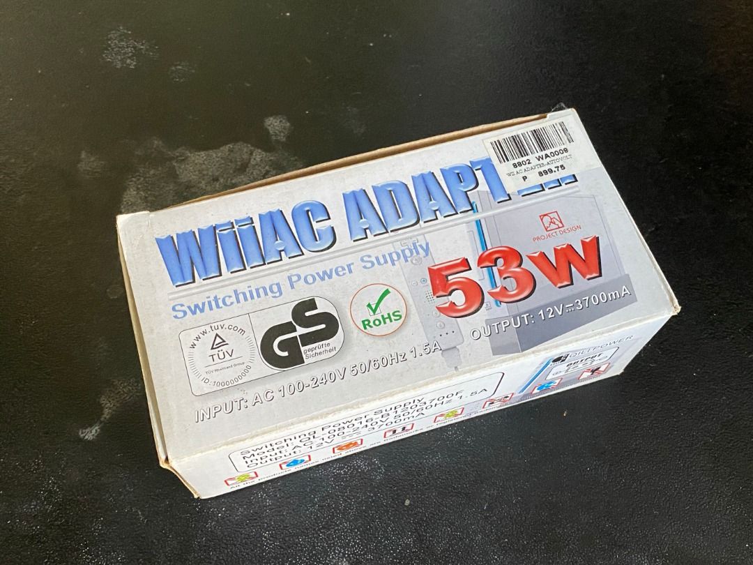 Wii AC Adaptor 53W (Category: Cables & Adaptors) located in Santa Rosa. Submitted by steezyeezy (Listing ID 1425537224, Image 2). Description: Wii AC Adaptor. It is a switching power supply with an output of 12V-3700mA. The input is AC 100-240V 50/60Hz 1.5A. The model number is QL-08016-B1203700F. It is a 53W adaptor. The plug type is A type..
