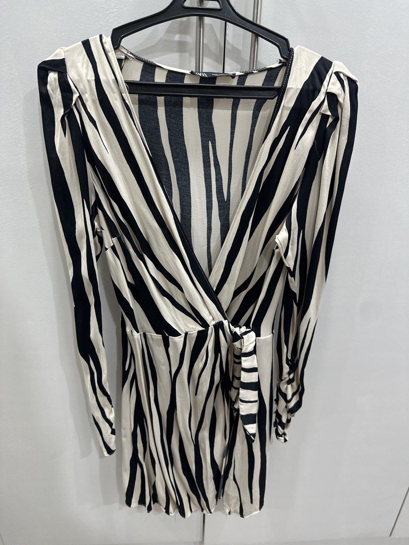 Zara Zebra Print Wrap Dress (Category: Dresses) located in San Juan City. Submitted by closetkeepers (Listing ID 1425574579, Image 1). Description: .