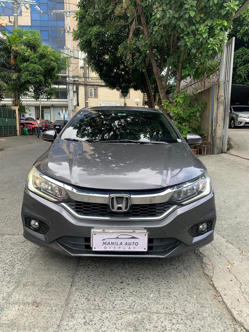 2018 Honda City 1.5L (Category: Used Cars) located in Pasig City. Submitted by mad_cars (Listing ID 1429562919, Image 1). Description: 2018 HONDA CITY 1.5L E CVT GAS AUTOMATIC TRANSMISSION ₱429,000 Modern Steel 1 ending plate 44tkms mileage Automatic Transmission 1.5L Gasoline Engine All Power Power Steering Power Windows Power Side Mirrors Central Locking Cold Aircon AM/FM Radio With SRS Airbags Clean By the way, my name is SIR DAVID. Please loo