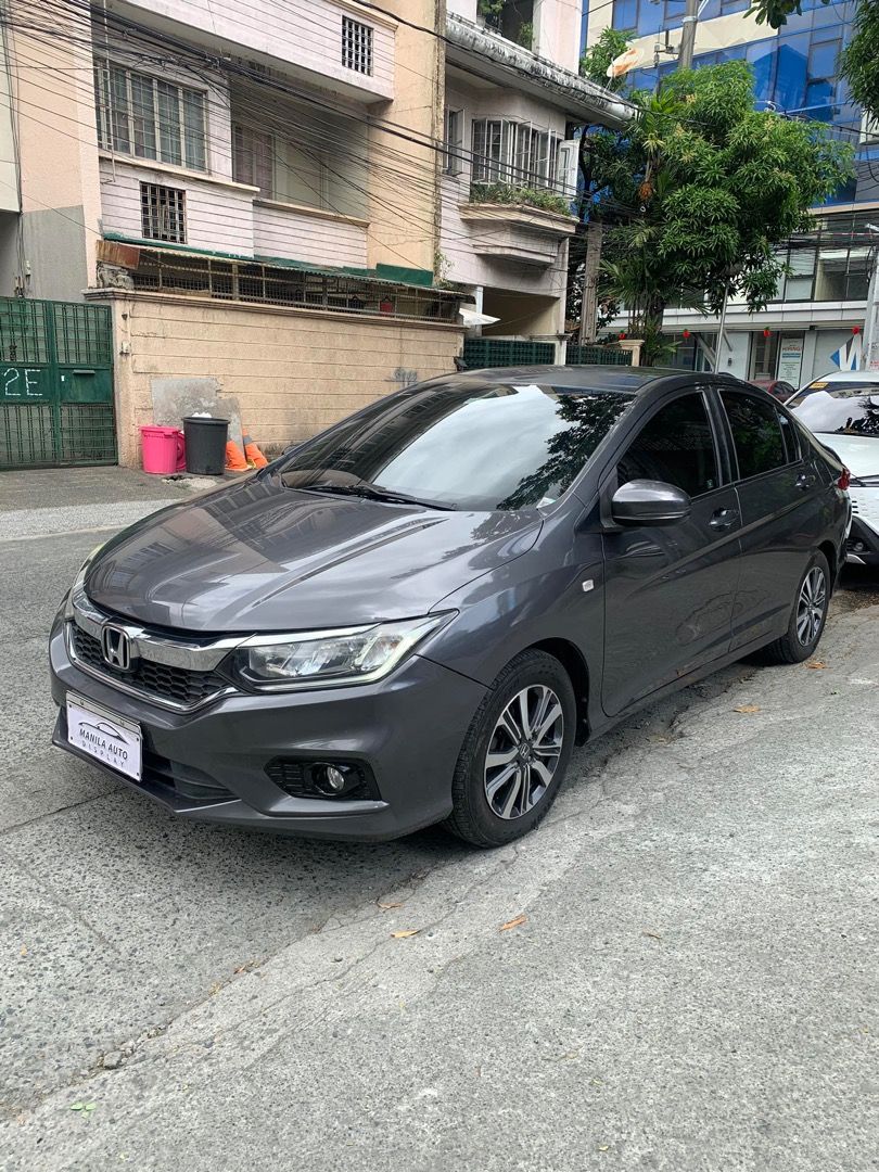 2018 Honda City 1.5L (Category: Used Cars) located in Pasig City. Submitted by mad_cars (Listing ID 1429562919, Image 3). Description: 2018 HONDA CITY 1.5L E CVT GAS AUTOMATIC TRANSMISSION ₱429,000 Modern Steel 1 ending plate 44tkms mileage Automatic Transmission 1.5L Gasoline Engine All Power Power Steering Power Windows Power Side Mirrors Central Locking Cold Aircon AM/FM Radio With SRS Airbags Clean By the way, my name is SIR DAVID. Please loo