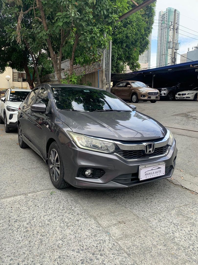 2018 Honda City 1.5L (Category: Used Cars) located in Pasig City. Submitted by mad_cars (Listing ID 1429562919, Image 2). Description: 2018 HONDA CITY 1.5L E CVT GAS AUTOMATIC TRANSMISSION ₱429,000 Modern Steel 1 ending plate 44tkms mileage Automatic Transmission 1.5L Gasoline Engine All Power Power Steering Power Windows Power Side Mirrors Central Locking Cold Aircon AM/FM Radio With SRS Airbags Clean By the way, my name is SIR DAVID. Please loo