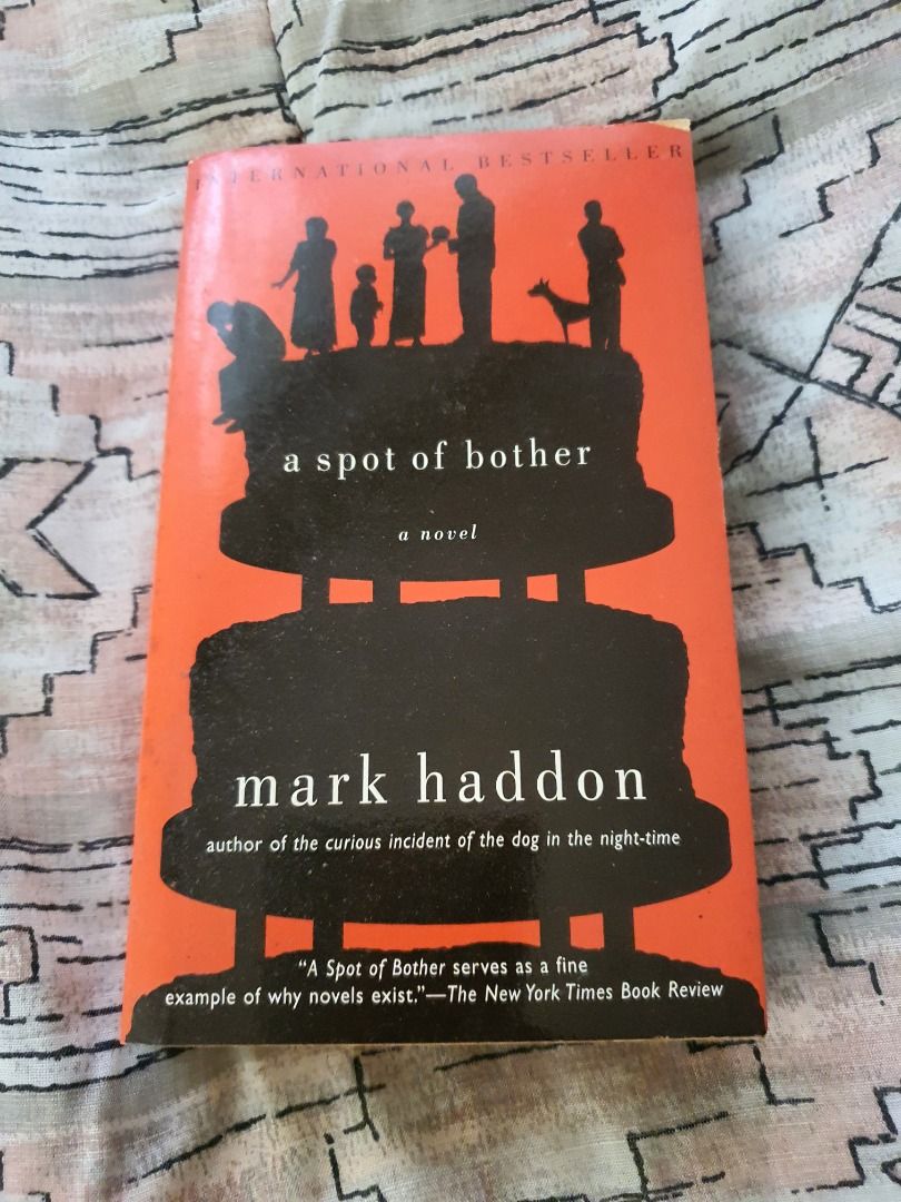 A Spot of Bother by Mark Haddon (Category: Storybooks) located in Quezon City. Submitted by cuiquesuum (Listing ID 1429552986, Image 1). Description: Light, foxing spots and a tanned oxidation to the pages. The binding is secure. There is a 2-line writing on the first page by the previous owner. Cover is intact but shows clear, noticeable wear, such as scuffs, minor creases, or edge wear. It is in perfectly readable condition. .