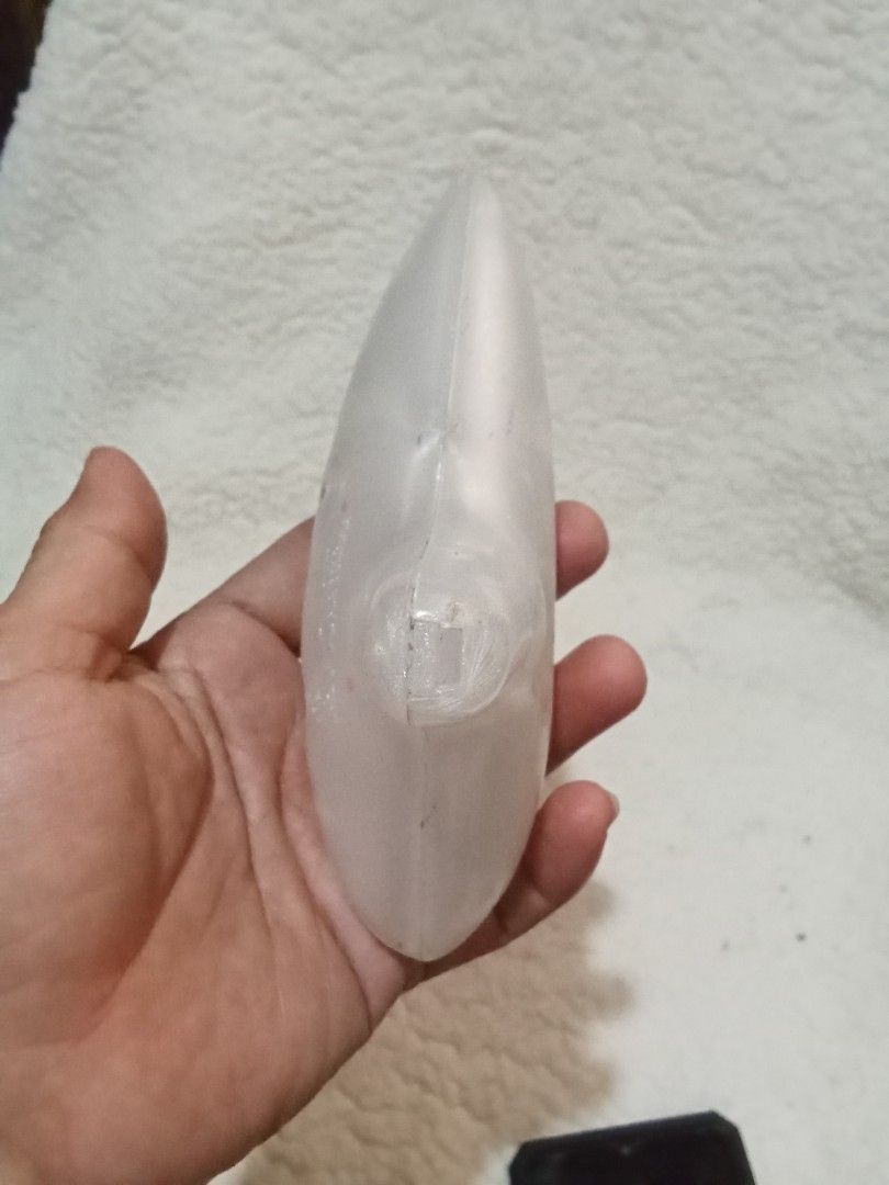 ACNIGHT Ocarina (Category: Musical Instruments) located in Bocaue. Submitted by marajapansurplus (Listing ID 1429561073, Image 3). Description: ACNIGHT ocarina. It has a pearlescent white finish. The ocarina has multiple finger holes. The mouthpiece is located on the bottom right. The brand name is visible on the body of the instrument..