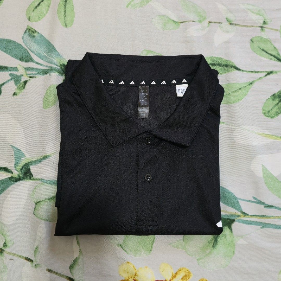 Adidas Men Training Polo Shirt 2XL (Category: Tshirts & Polo Shirts ) located in Pasay City. Submitted by monmonish (Listing ID 1429520172, Image 1). Description: Color: Black Size: A/2XL EU Dri-fit type Bought this at online for 2,000php. Never been used but has a sign of flaw. See flaw in the picture No more tag, washed once Dimensions: Shoulder - 19" Width- 23.5" Length - 29" RFS: Does not fit *Actual color may vary due to lighting *Please all