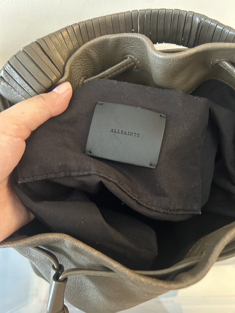 Allsaints Lambskin Bucket Bag (Category: Cross-body Bags) located in Mandaluyong City. Submitted by geri3373 (Listing ID 1429507976, Image 3). Description: Color: Brown with gray undertone No issue.