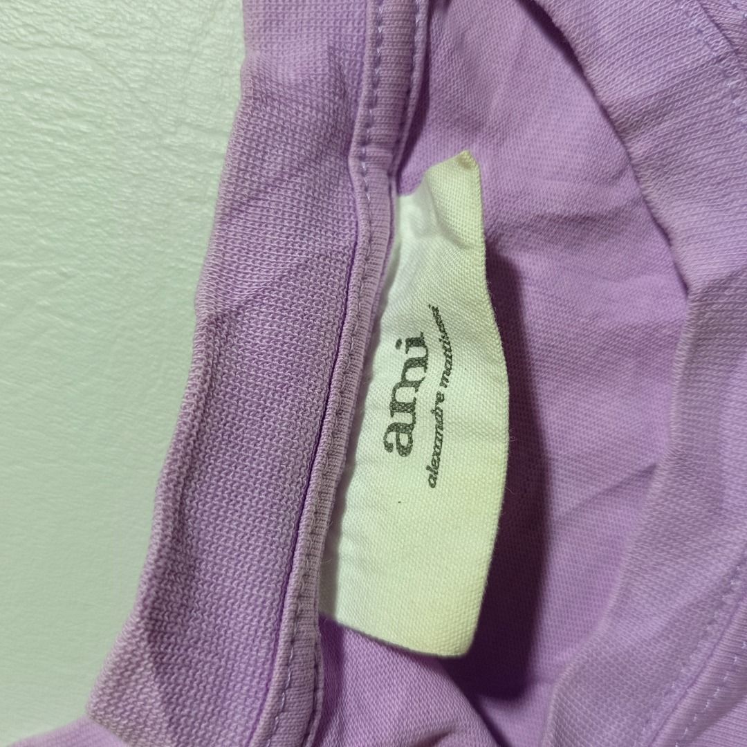 AMI VIOLET TSHIRT💜 (Category: Luxury Apparel) located in Baguio. Submitted by freshmarket_2600 (Listing ID 1429638744, Image 2). Description: 350 Brand: AMI Tags: Complete Size: Med Dimension:L26.5W23 Condition: Excellent Color rate: 10/10 Color: Violet Issue/s: None.