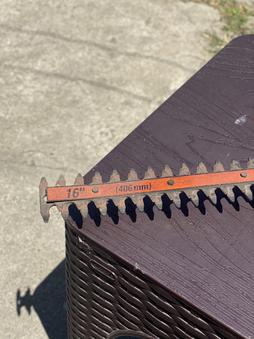 Black & Decker 16" Hedge Trimmer (Category: Gardening Tools & Ornaments) located in Los Banos. Submitted by ejb418 (Listing ID 1429519050, Image 3). Description: Black & Decker hedge trimmer has a 16" (406mm) blade. It is a TR185 Type 3 model, operating at 120V and 2.4A. The trimmer is green and has an orange blade. The price tag on the trimmer indicates a price of ₱. The plug indicates it is a 110V model..