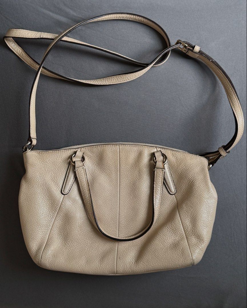Coach Kelsey Leather Satchel (Category: Luxury Bags & Wallets) located in Quezon City. Submitted by nicsuv (Listing ID 1429533516, Image 2). Description: For Sale: Brand: Coach Model: Kelsey Leather Satchel (Small) Color: Beige • with visible signs of use • leather is still in good shape • needs cleaning Issue: PU Label Degradation Asking Price: ₱3,000 nego RFS: Decluttering.