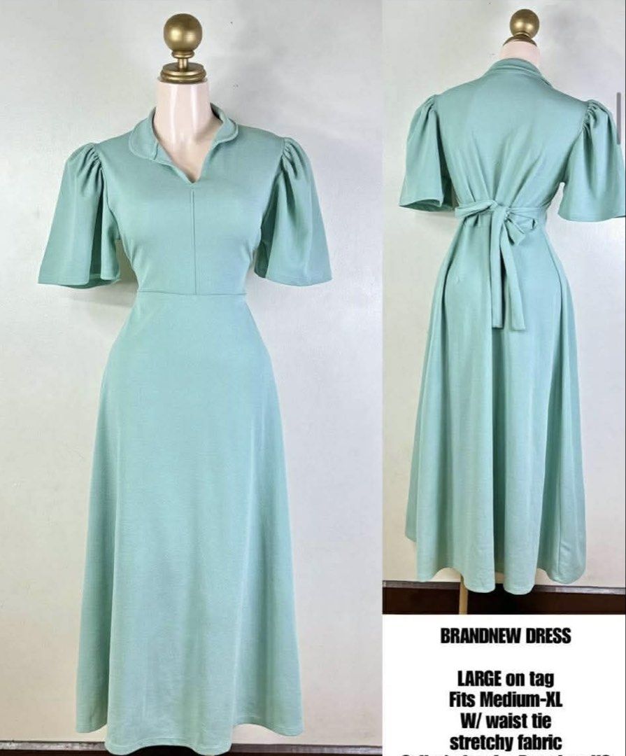 Dress with Waist Tie (Category: Dresses) located in Angeles City. Submitted by danedane06 (Listing ID 1429667412, Image 2). Description: Brand new green dress. It has a waist tie and is made of stretchy fabric. The dress is labeled as Large on the tag, but fits Medium to XL. This is a premium quality dress..