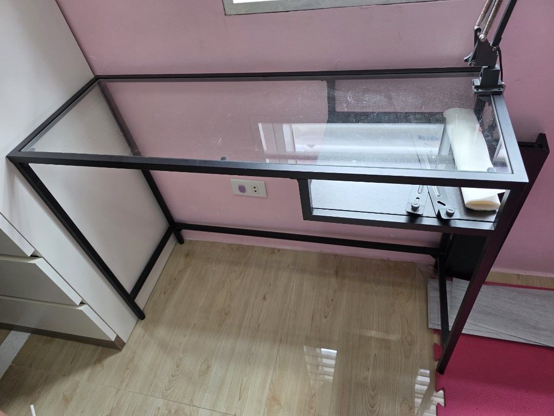 Glass Top Drafting Table (Category: Tables & Sets) located in Noveleta. Submitted by happy_shopmanila (Listing ID 1429586354, Image 1). Description: selling ikea item. rarely used in very good condition. free computer chair for girl.