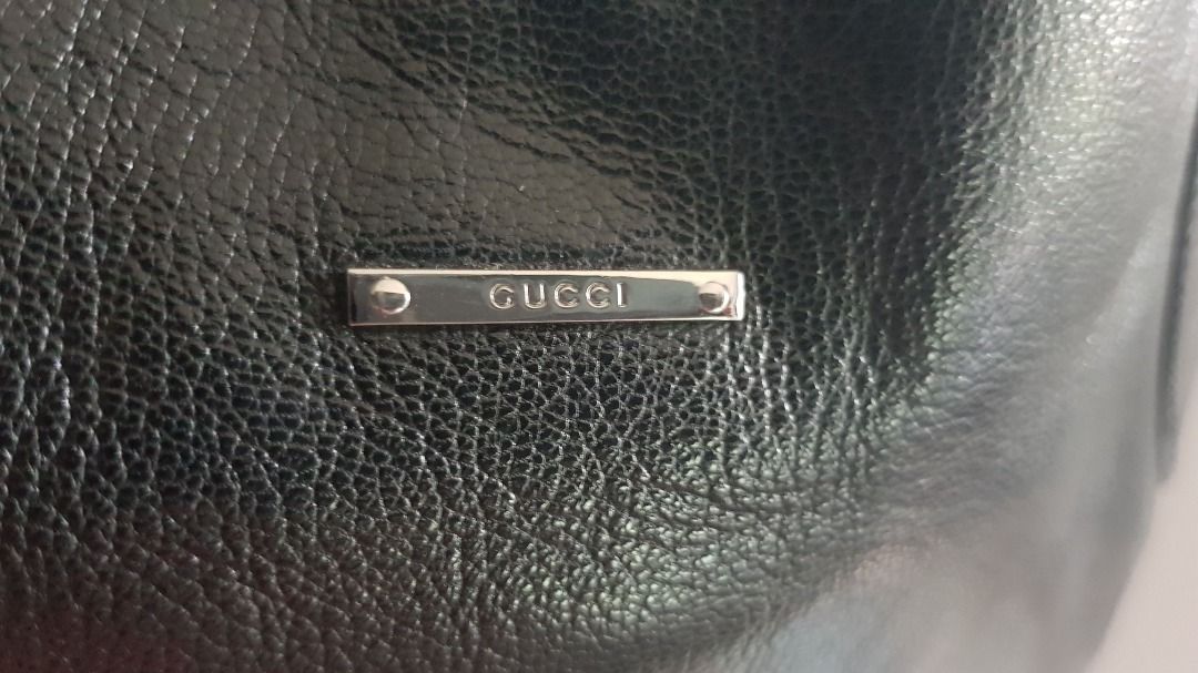 Gucci Black Leather Tote Bag (Category: Luxury Bags & Wallets) located in Los Banos. Submitted by mommybabyshopper (Listing ID 1429522166, Image 2). Description: • Authentic Gucci tote bag in black cowhide leather. • With entrupy certificate of authenticity. • Bag only, no box/paper bag/dustbag • Very nice silver hardware.