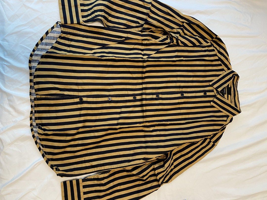 H&M Striped Shirt - Regular Fit (Category: Tshirts & Polo Shirts ) located in Makati City. Submitted by rye16 (Listing ID 1429564260, Image 1). Description: - H&M striped shirt - Color: Navy and beige - Size: Small (S) - Regular fit - Button-down - Long sleeves - Collared neckline.