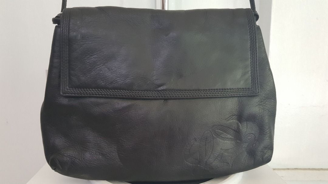 Loewe Leather Crossbody Bag (Category: Luxury Bags & Wallets) located in Los Banos. Submitted by mommybabyshopper (Listing ID 1429520771, Image 2). Description: • Authentic vintage Loewe crossbody bag in black nappa leather. • With entrupy certificate of authentication • Bag only, no box/paper bag/dustbag • Some tiny scratches sa likod ng bag, some tarnishing sa hardwares • Leather feels so soft and lux.