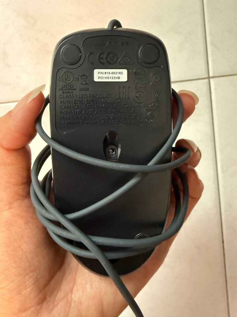 Logitech Wired Mouse (Category: Mouse & Mousepads) located in Singapore. Submitted by justforl (Listing ID 1429565798, Image 2). Description: Black Logitech wired mouse. In good working condition. Features a standard USB connection. Perfect for everyday use..