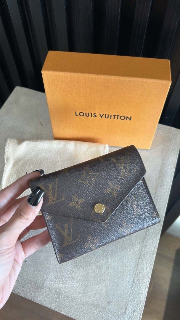 Louis Vuitton Monogram Wallet (Category: Luxury Bags & Wallets) located in Manila. Submitted by bagsdetails27 (Listing ID 1429568241, Image 1). Description: Louis Vuitton Monogram Canvas Victorine Compact Wallet Preowned Comes with box & dustbag 25,000.