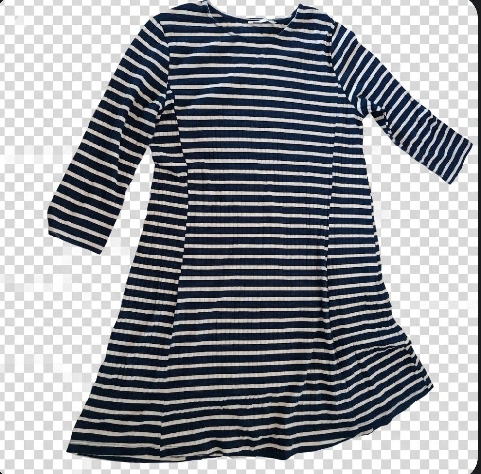 Mango Striped Dress (Category: Dresses) located in Bacoor. Submitted by pamelott (Listing ID 1429513707, Image 1). Description: Key details: Color & Pattern: Navy blue base with horizontal white stripes throughout Sleeves: Long sleeves, slightly fitted Neckline: Simple round neckline Fit & Shape: Fitted at the top and gradually flares out into an A-line silhouette Length: Looks like a knee-length or above-the-knee dress Fabric: Soft, stretchy mat