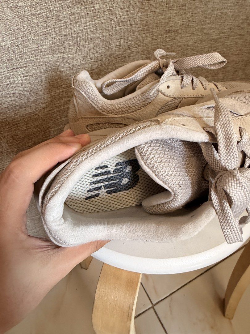 New Balance 327 Beige Sneakers (Category: Sneakers) located in Taguig. Submitted by johnjohnpaul (Listing ID 1429525263, Image 2). Description: These New Balance 327 sneakers are in a beige color. The shoes have a mesh and suede upper. The soles show some signs of wear. The New Balance logo is visible on the side of the shoe. Mainly used this for running. Wash it and it’ll be good as new. Still Negotiable.
