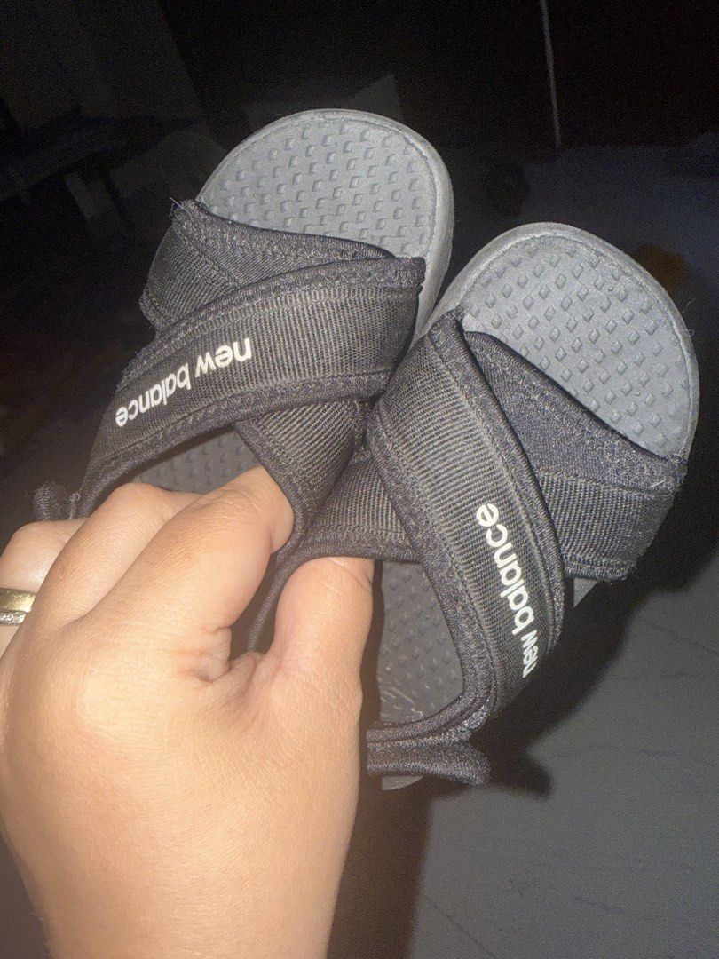 New Balance Black Sandals Size 160 (Category: Babies & Kids Fashion) located in Binan City. Submitted by jomzapplefiguverse (Listing ID 1429650434, Image 2). Description: Preloved New Balance Sandals – Good Condition 👟 Selling my original New Balance sandals. Still in good condition, lightly used, and well taken care of. Super comfortable and perfect for everyday use, pang lakad, errands, or casual outfit. ✔️ Authentic ✔️ Durable and lightweight