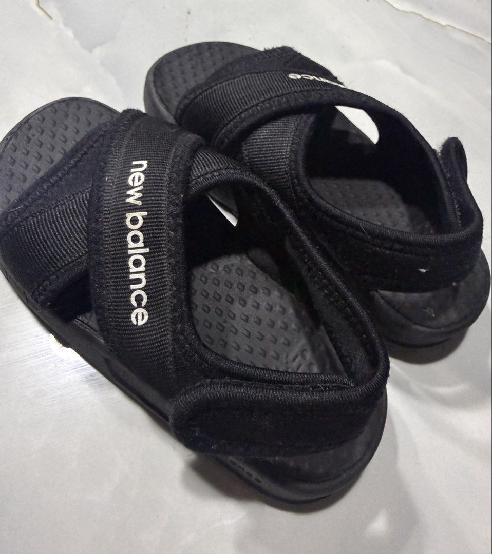 New Balance Black Sandals Size 160 (Category: Babies & Kids Fashion) located in Binan City. Submitted by jomzapplefiguverse (Listing ID 1429650434, Image 1). Description: Preloved New Balance Sandals – Good Condition 👟 Selling my original New Balance sandals. Still in good condition, lightly used, and well taken care of. Super comfortable and perfect for everyday use, pang lakad, errands, or casual outfit. ✔️ Authentic ✔️ Durable and lightweight