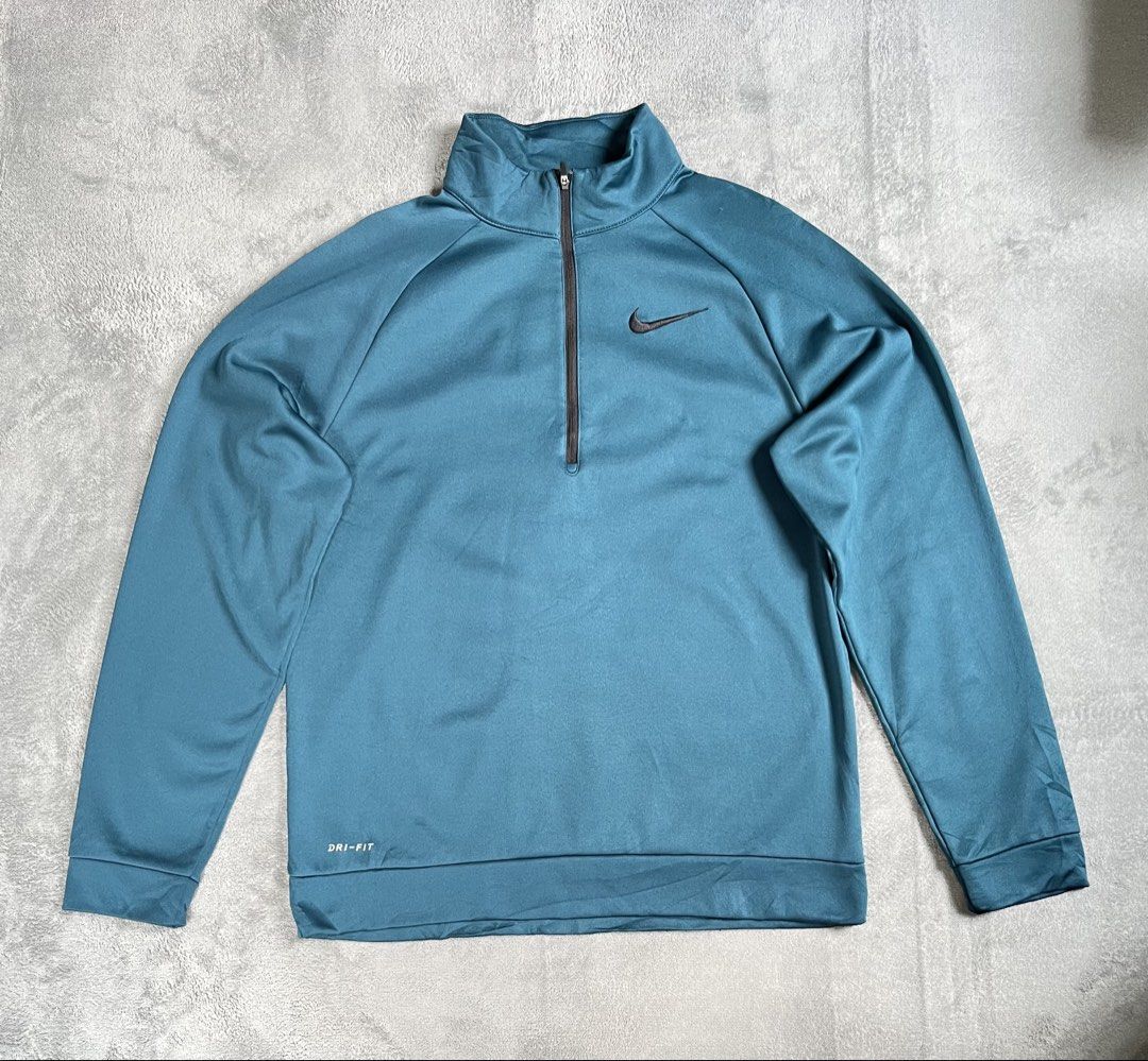 Nike Dri-FIT Quarter-Zip Sweatshirt (Category: Coats, Jackets and Outerwear) located in Manila. Submitted by thrifteracollection24 (Listing ID 1429526236, Image 1). Description: Nike Quarter zip❗️❗️❗️ As new condition Authentic and Legit Medium on tag Embroidery Dimension Width: 22 Length: 28 Dm me to purchase🫶 Location: Mangaldan, Pangasinan.