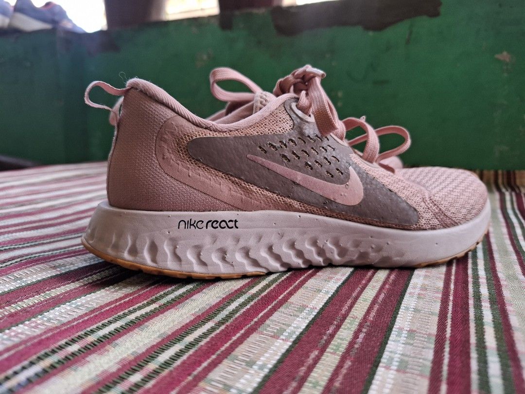 Nike React Running Shoes - Rust Pink (price negotiable) (Category: Sneakers) located in Manila. Submitted by shee_shells (Listing ID 1429508896, Image 3). Description: women's pink nike legend react from USA 📏: EU 38/ UK 5/ US 7 📍Fairview, QC 💵: ₽1,200 (negotiable if sure buyer) rfs: need funds ‼️ free sf within metro manila ‼️ 🚚 Mod: j&t, lbc, lalamove, meet up(fcm only) & spx 💵 Mop: Gcash & Cash (meetups only).
