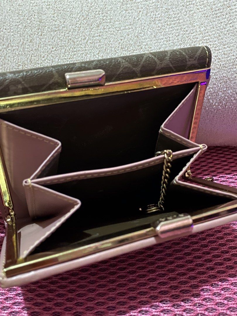 Nina Ricci Tri-Fold Wallet (Category: Wallets & Card holders) located in Taguig. Submitted by nekosan_ (Listing ID 1429540354, Image 2). Description: Good condition .