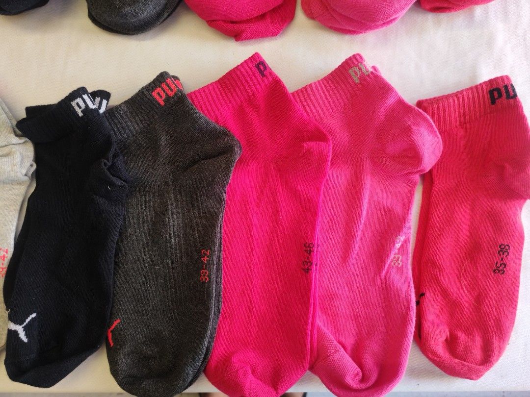 Original Puma Ankle Socks - Assorted Colors (Category: Socks) located in Quezon City. Submitted by rowem (Listing ID 1429558381, Image 3). Description: 380 - Pair 1000 - 3Pairs 1200 - 4Pairs Type: Ankle-length sports socks. Material: Usually a blend of 80% Cotton, 15% Nylon, and 5% Spandex. Key Features: Comfort: Designed with a durable elastic top and soft, absorbent cotton for a full comfort fit. Performance: Many models are treated with DRI+ m