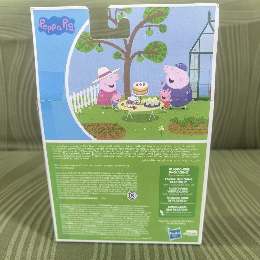 Peppa Pig Surprise Garden Playset (Category: Kids Toys) located in Manila. Submitted by kenslie (Listing ID 1429536669, Image 2). Description: Peppa Pig playset features a surprise garden theme. It includes a Peppa Pig figure with gardening tools and several surprise gift boxes. The packaging indicates it's suitable for ages 3+. The box also shows a picnic scene with Peppa Pig and her family. It is a plastic-free packaging..