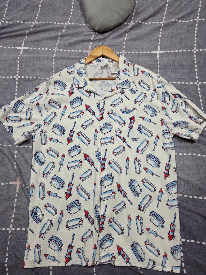 Printed Short Sleeve Shirt (Category: Tshirts & Polo Shirts ) located in Aringay. Submitted by ajwall (Listing ID 1429604495, Image 1). Description: IML Button Down Polo Color: White (with print) Excellent Condition Size: XL Dimes: 22x30 Price: 180 + sf.