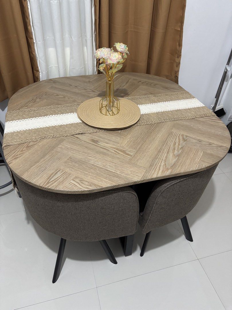 RUSH MOVING OUT SALE Modern Dining Table Set with 4 Chairs (Category: Tables & Sets) located in Taguig. Submitted by xxibgdrgn21 (Listing ID 1429660147, Image 1). Description: Selling our dining table set for 8k Included: Chairs Table runner, placemats and decor as seen on pic Pickup here @ sta ana pateros Pm for exact address.