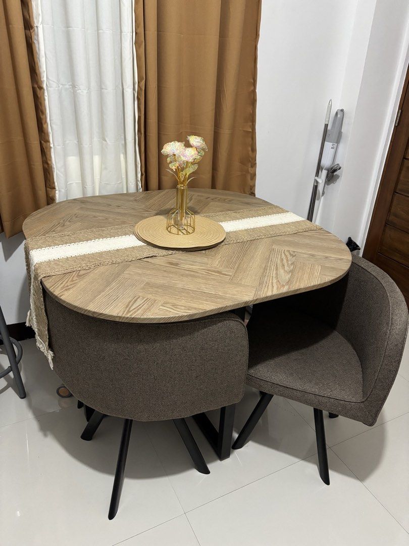RUSH MOVING OUT SALE Modern Dining Table Set with 4 Chairs (Category: Tables & Sets) located in Taguig. Submitted by xxibgdrgn21 (Listing ID 1429660147, Image 2). Description: Selling our dining table set for 8k Included: Chairs Table runner, placemats and decor as seen on pic Pickup here @ sta ana pateros Pm for exact address.