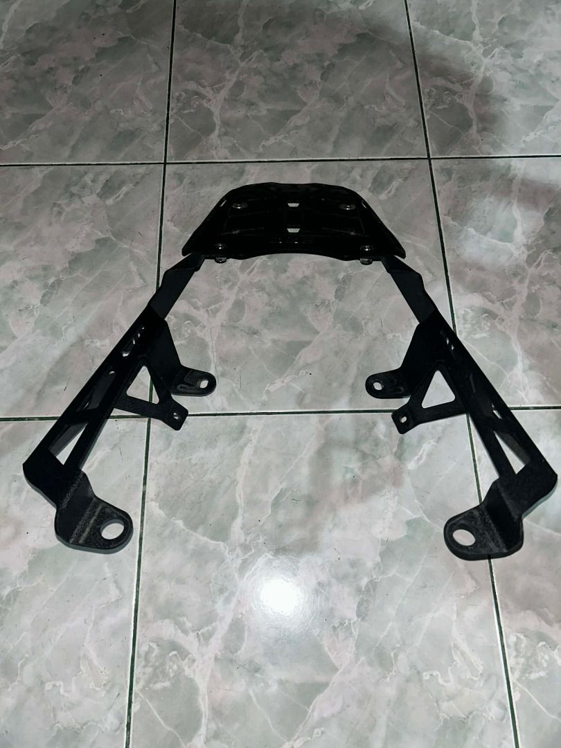 SEC Q3 Motorcycle Bracket for ADV 160 (Category: Other Motorcycles Parts and Accessories) located in Caloocan City. Submitted by tinee_tot (Listing ID 1429604530, Image 3). Description: - orig price ₱1,500, selling for ₱800 - Nawala na yung center crossbar connector piece (see photo) RFS: nakatambak lang.