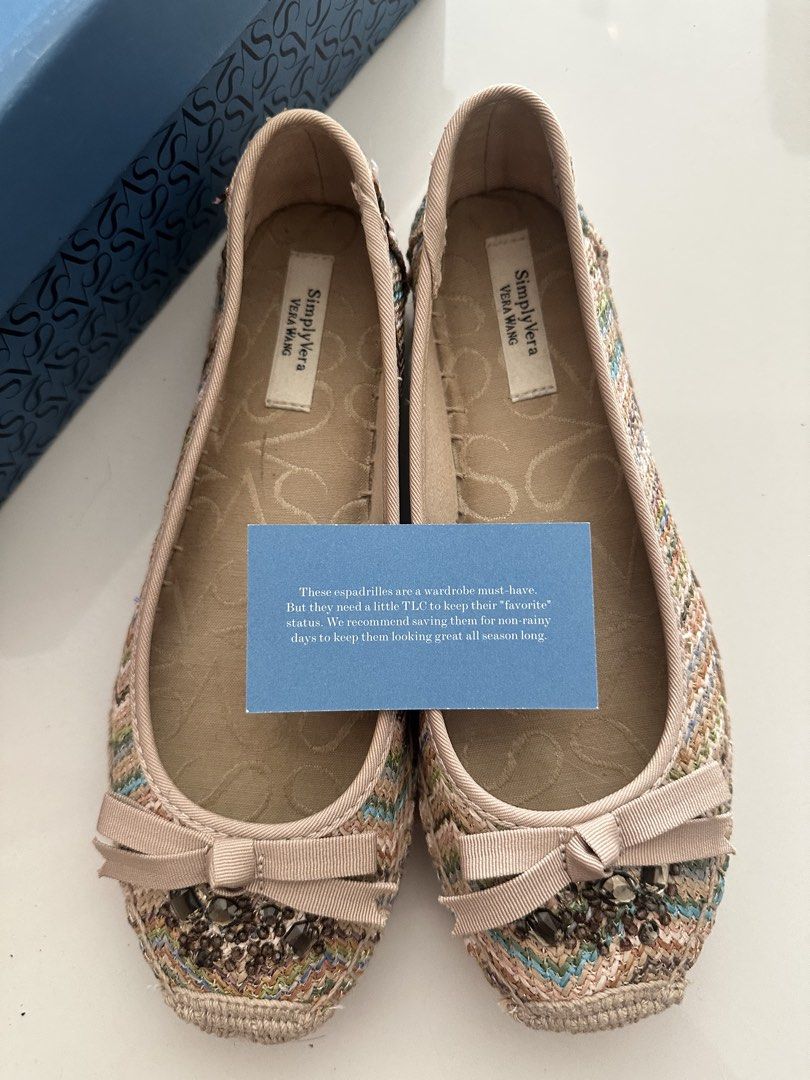Simply Vera Vera Wang Espadrilles (Category: Flats & Sandals) located in Taguig. Submitted by c.preloveditems (Listing ID 1429567613, Image 1). Description: These Simply Vera Vera Wang espadrilles are a wardrobe essential. They feature a woven design with a bow detail. The shoes have a neutral color palette. Used 1-2x Comes with box. Size 7 on tag but runs small (23cm) .
