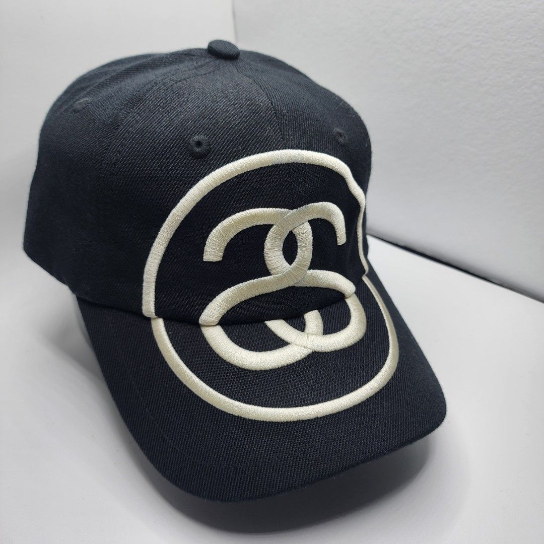 Stussy Embroidered Cap (Category: Caps & Hats) located in Quezon City. Submitted by randomthangz (Listing ID 1429577685, Image 2). Description: Stussy cap features an embroidered logo on the front. It has a black body with a white logo and a black adjustable strap at the back. The cap includes a Stussy tag inside with the text "Have a Good Vibe!"..