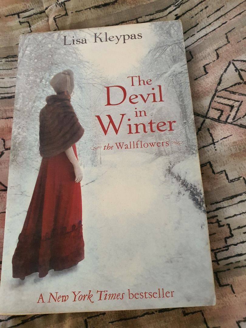 The Devil in Winter by Lisa Kleypas (Category: Storybooks) located in Quezon City. Submitted by cuiquesuum (Listing ID 1429551826, Image 1). Description: Light, foxing spots and a tanned oxidation to the pages. The binding is secure. There is a 2-line writing on the first page by the previous owner. Cover is intact but shows clear, noticeable wear, such as scuffs, minor creases, or edge wear. It is in perfectly readable condition. .