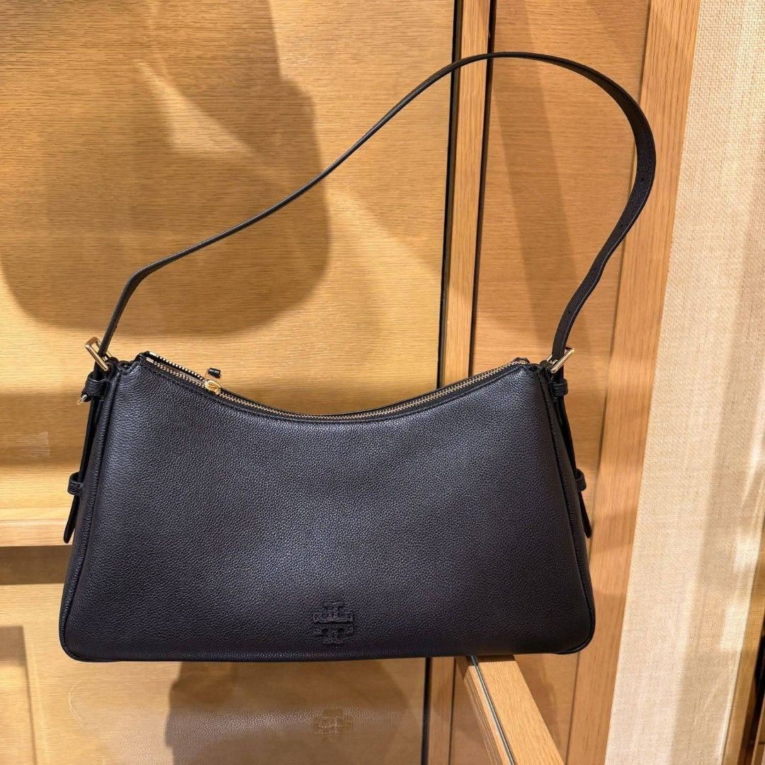 Tory Burch The Zip Top Shoulder Bag in Black (Category: Shoulder Bags) located in Manila. Submitted by mahaechn (Listing ID 1429660077, Image 3). Description: 📌 ON HAND ‼️ 👜 Tory Burch The Zip Top Shoulder Bag ✨ Brand new and sealed — with dust bag & paper bag! Super cute, compact, and perfect for your daily lakads or errands! Stylish yet spacious for all your essentials. 📏 Size: 10.5-14" L× 6.5" H x 4" W( Bottom) ✅ With dust bag & paper bag ✅