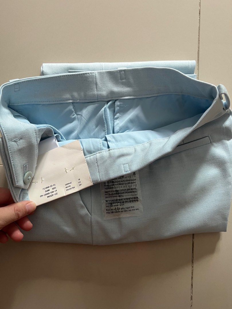 Uniqlo Slacks (Category: Other Bottoms) located in Quezon City. Submitted by ex-box (Listing ID 1429546794, Image 2). Description: Women EZY Ankle Pants (2 way Stretch) Size: Small Waist 60-66cm Hip 85-91cm Color: Blue / Light Blue .