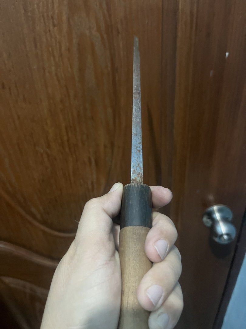 Vintage Japanese Deba Knife. (Category: Knives & Chopping Boards) located in Pasay City. Submitted by beye01 (Listing ID 1429221235, Image 3). Description: Vintage Japanese knife with a wooden handle. The handle is made of wood and has a dark collar. The blade has some markings on it. It is a used item. Blade is about 20cm and handle is about 14cm. Please check out my other items for sale. Thank you..