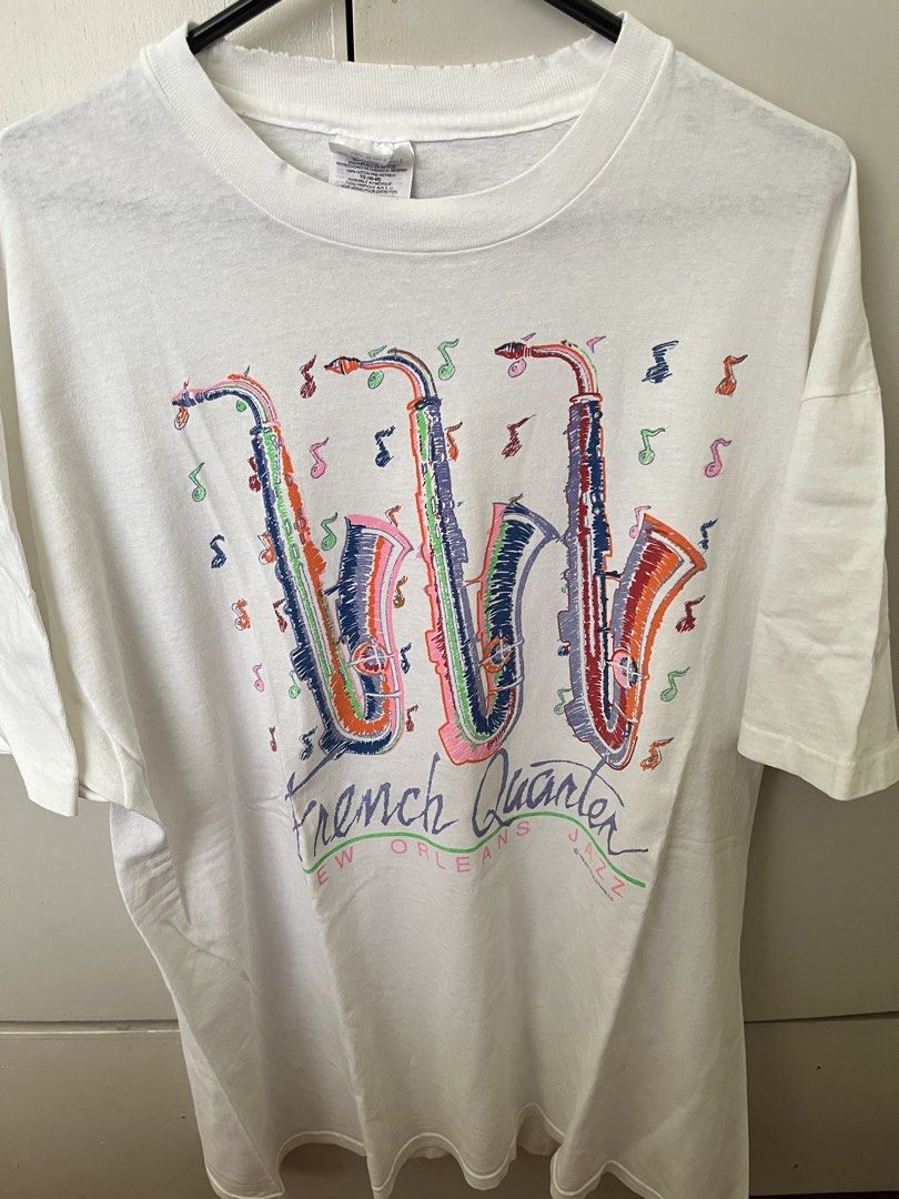 Vintage Jazz Tee (Category: Tshirts & Polo Shirts ) located in Quezon City. Submitted by _earlb (Listing ID 1429518820, Image 1). Description: 24x30 Soft cotton Worn in look Nice graphic Few stains at back Neckline distressing .