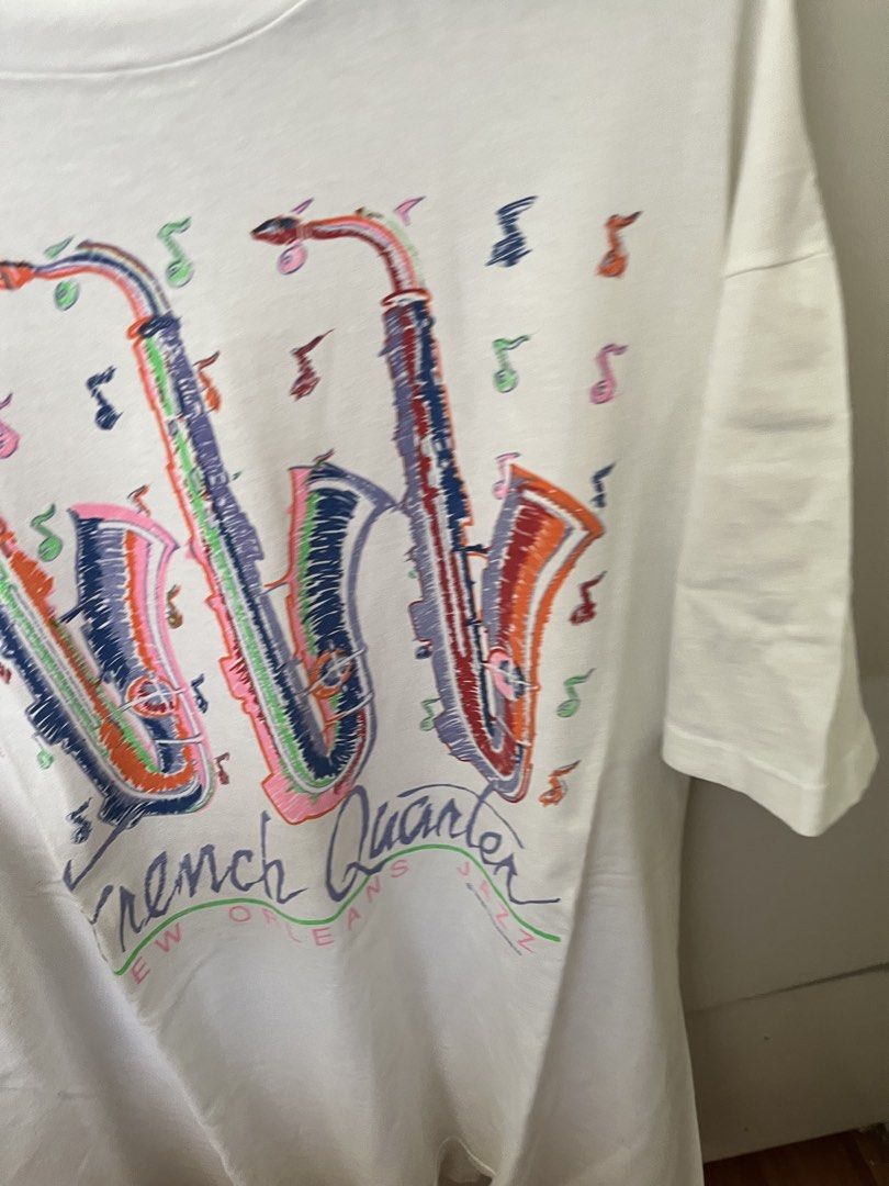 Vintage Jazz Tee (Category: Tshirts & Polo Shirts ) located in Quezon City. Submitted by _earlb (Listing ID 1429518820, Image 2). Description: 24x30 Soft cotton Worn in look Nice graphic Few stains at back Neckline distressing .