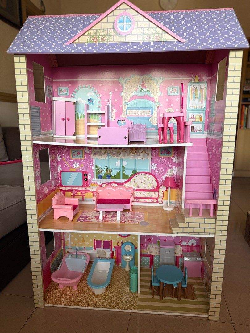 Wooden Big Doll House (Category: Kids Toys) located in Las Pinas. Submitted by a_madz (Listing ID 1429586222, Image 1). Description: Slightly nego Size: Height: 46 inches Length: 29 inches Width: 12 inches With flaws, stains on 2nd and 3rd floor ( pls check photos) You can pick up at BF Resort Village or book shipping. Buyer will shoulder shipping fee..