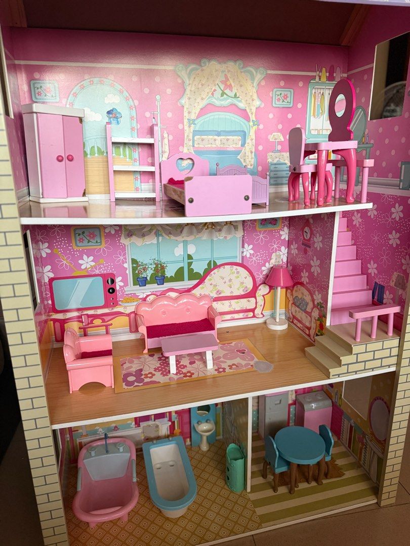 Wooden Big Doll House (Category: Kids Toys) located in Las Pinas. Submitted by a_madz (Listing ID 1429586222, Image 3). Description: Slightly nego Size: Height: 46 inches Length: 29 inches Width: 12 inches With flaws, stains on 2nd and 3rd floor ( pls check photos) You can pick up at BF Resort Village or book shipping. Buyer will shoulder shipping fee..