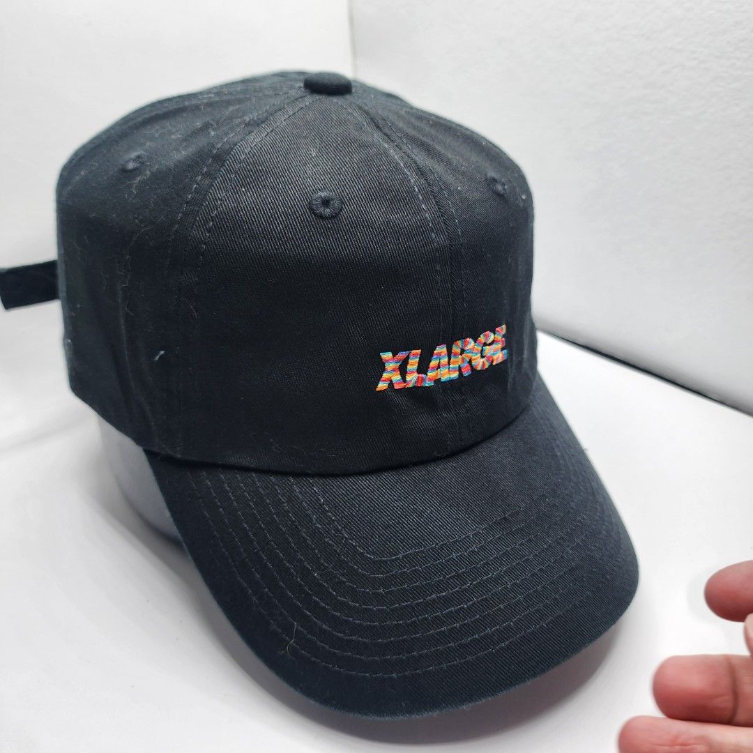 X-Large Cap (Category: Caps & Hats) located in Quezon City. Submitted by randomthangz (Listing ID 1429577567, Image 3). Description: Black cap with the X-Large logo embroidered on the side. Features a curved brim and an adjustable strap at the back. The interior has X-Large branding on the seams..