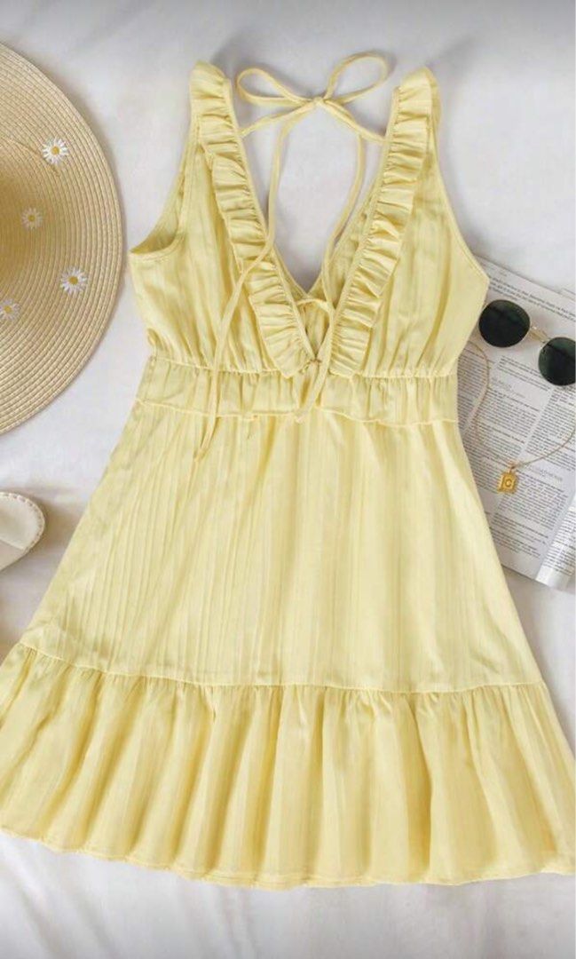 Yellow Ruffle Mini Dress (Category: Dresses) located in Agdangan. Submitted by userksn024 (Listing ID 1429551631, Image 2). Description: small to medium used once.