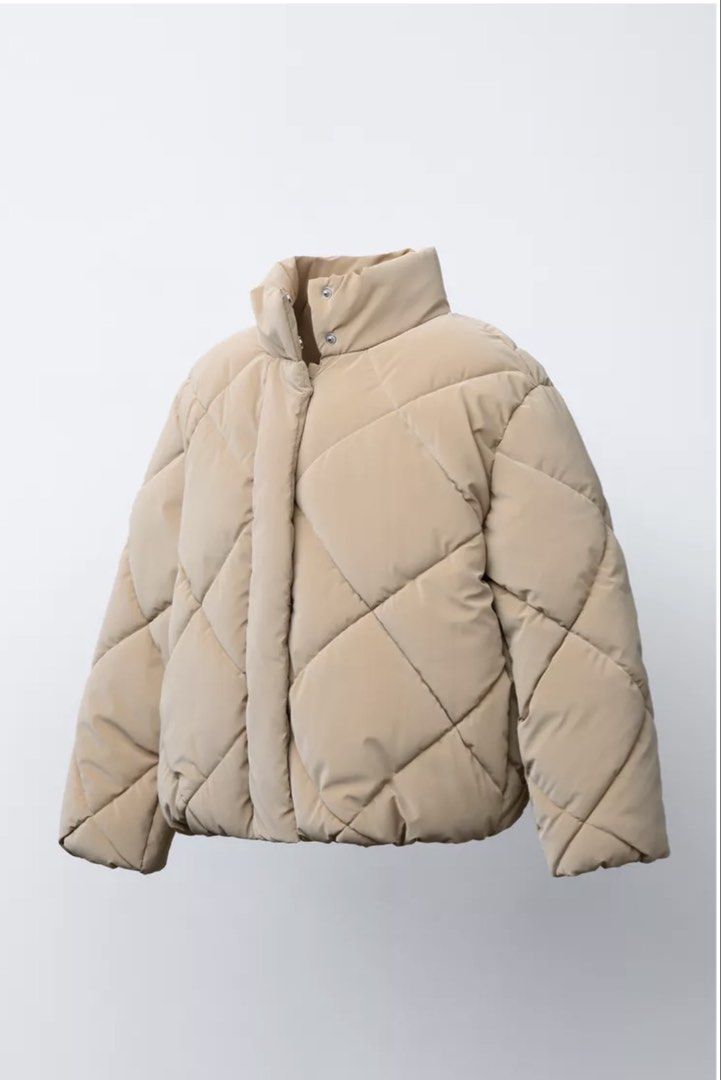 Zara Puffer Jacket (Category: Coats, Jackets and Outerwear) located in Mandaluyong City. Submitted by declutteringcorner (Listing ID 1429665797, Image 2). Description: Zara Puffer Jacket - camel color - check photos for the size - used twice .