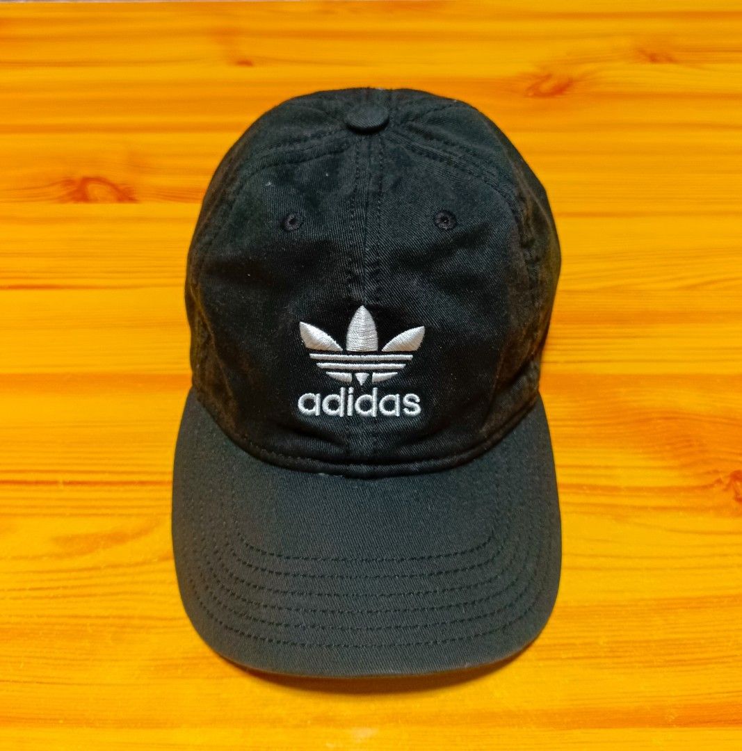 Adidas Cap (Category: Caps & Hats) located in Manila. Submitted by caps08 (Listing ID 1431232580, Image 2). Description: - Black Adidas cap - Embroidered trefoil logo - Adjustable strap - Striped interior lining with Adidas branding - Made of cotton.