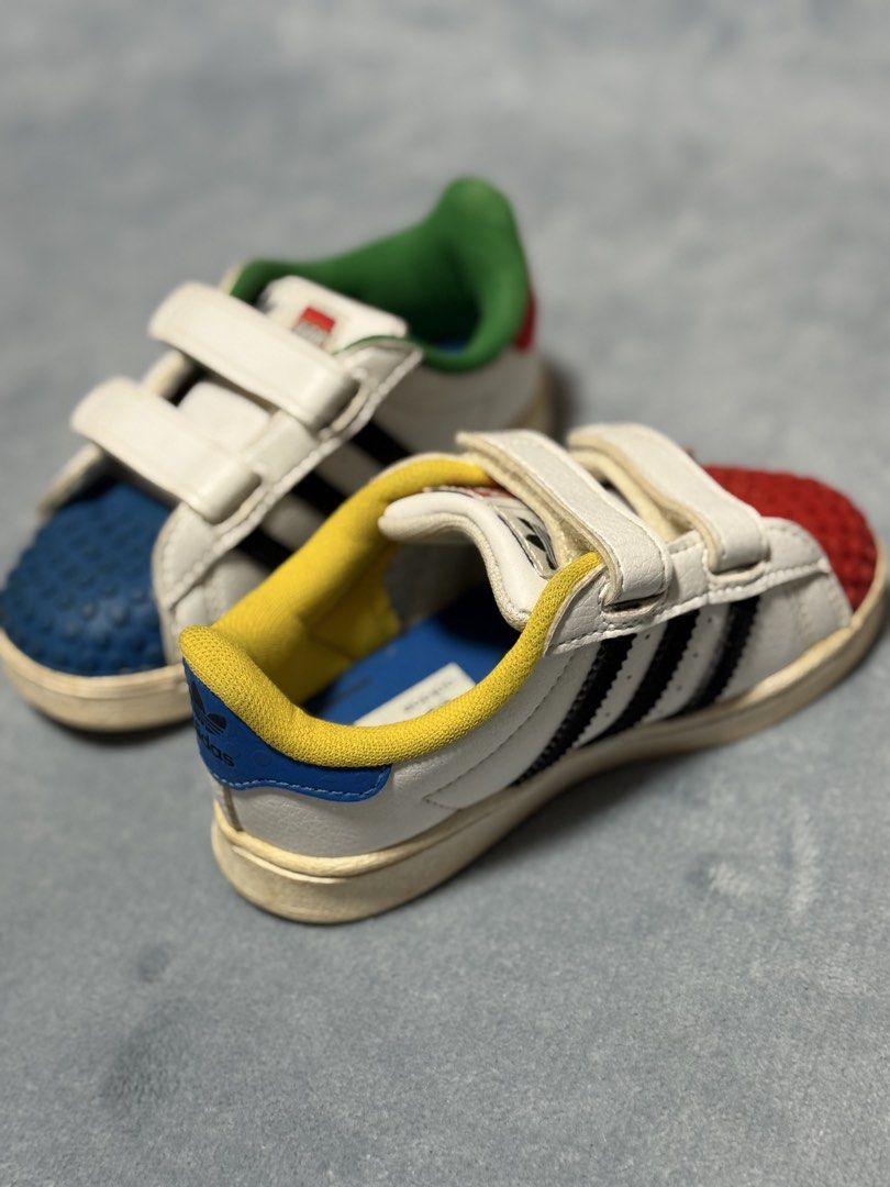 Adidas Shell Toe Lego (Category: Babies & Kids Fashion) located in Manila. Submitted by littleonesbydaddyjonah (Listing ID 1431249936, Image 3). Description: Without Box Antbite on the toebox US6.5K UK6K CM13.