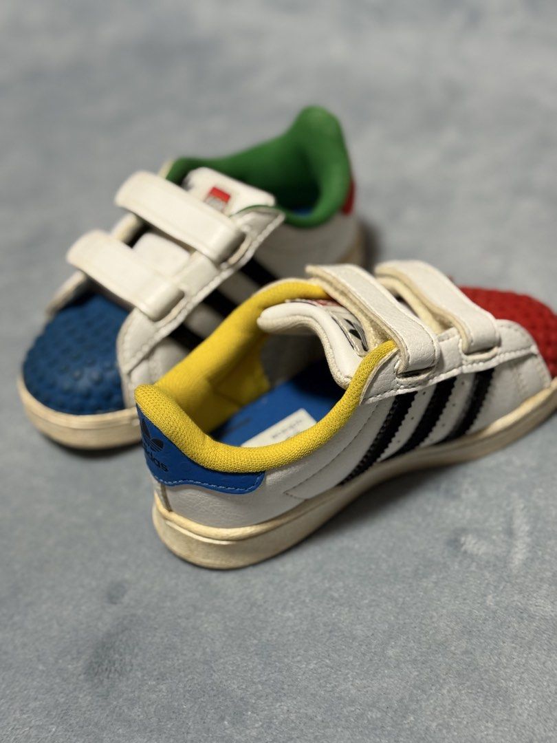 Adidas Shell Toe Lego (Category: Babies & Kids Fashion) located in Manila. Submitted by littleonesbydaddyjonah (Listing ID 1431249936, Image 2). Description: Without Box Antbite on the toebox US6.5K UK6K CM13.