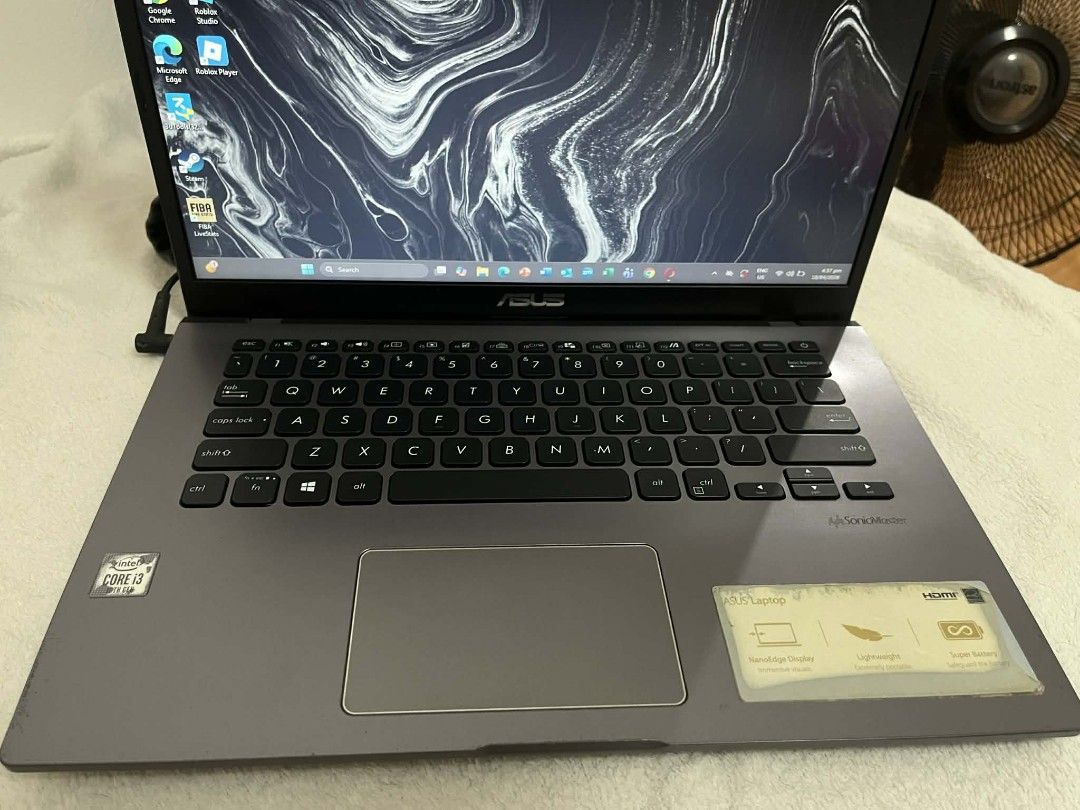 ASUS Vivobook Laptop (Category: Laptops & Notebooks) located in Manila. Submitted by ashleytori22429 (Listing ID 1431352823, Image 3). Description: - ASUS laptop (model: X409JA) - Intel Core i3 processor see photo for details personal use for my college files no history repair lady owner performance 100% battery 100% RFS: Upgrade negotiable for sure buyer location: taguig or parañaque .