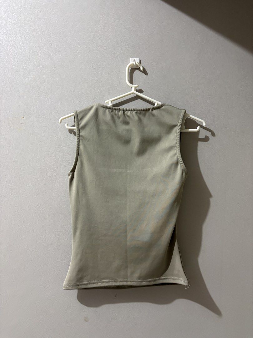 Augety Studio Olive Green Square Neck Tank Top (Category: Sleeveless) located in Quezon City. Submitted by kamtee (Listing ID 1431300922, Image 3). Description: Runs small / tight fit.